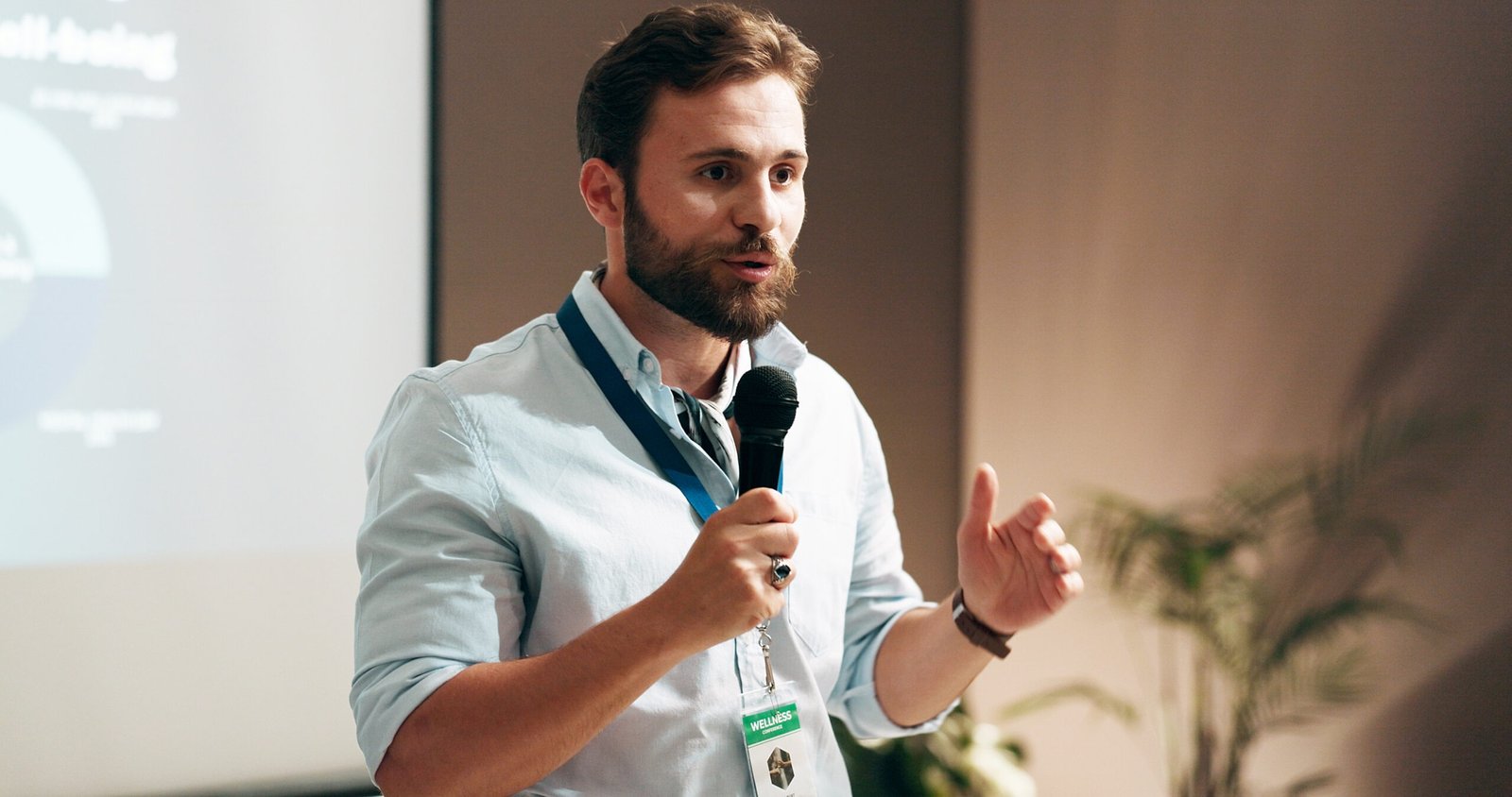 businessman-development-presentation-with-speaker-conference-room-wellness-training-education-forum-speech-microphone-with-corporate-coach-stage-public-relations-seminar